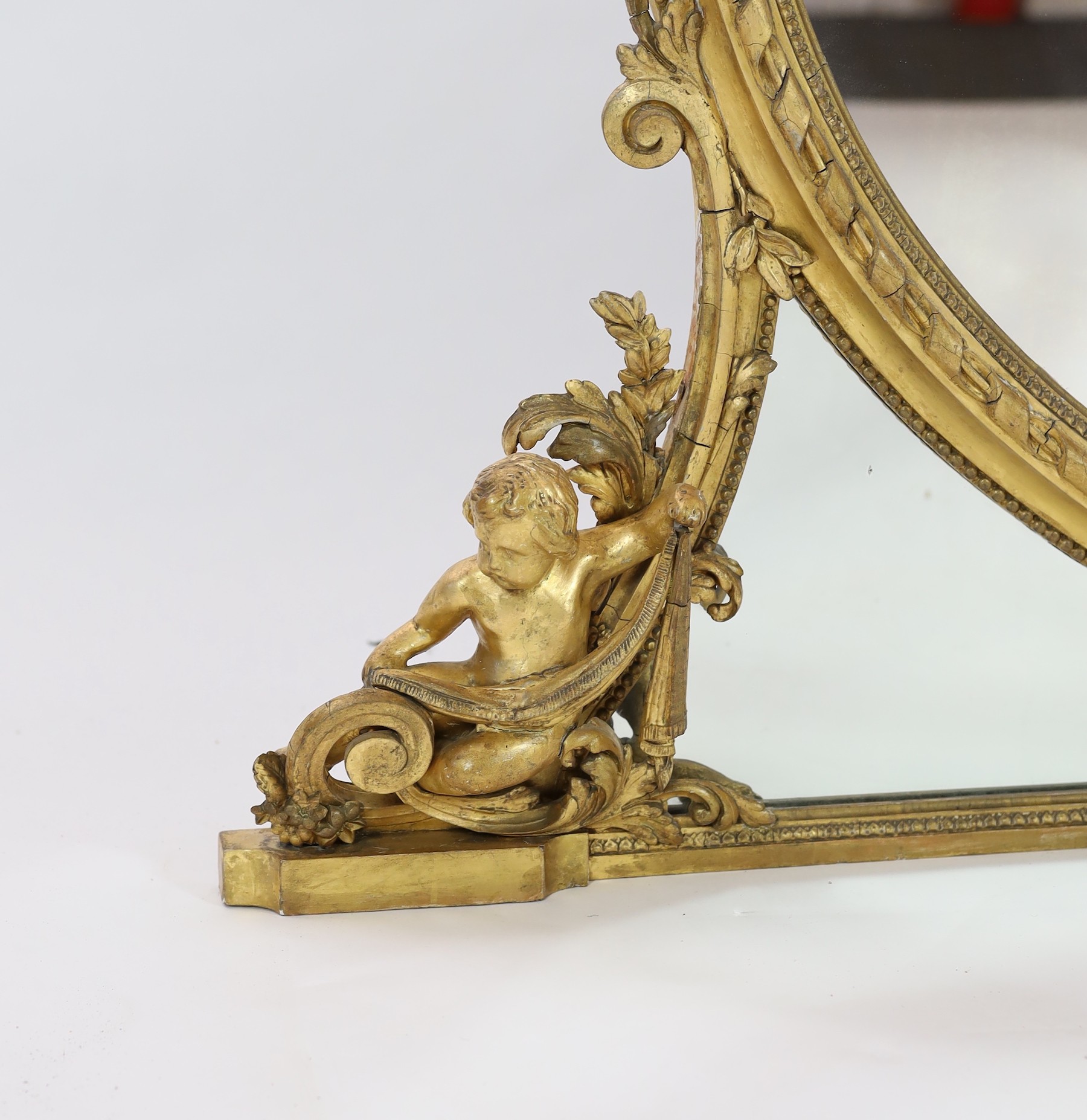 A Victorian giltwood and gesso overmantel mirror, width 176cm height 122cm